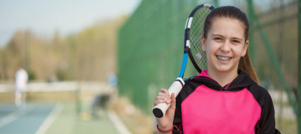 Girl with tennis racket